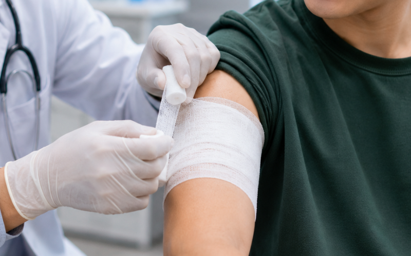Patient receiving compassionate wound care treatment